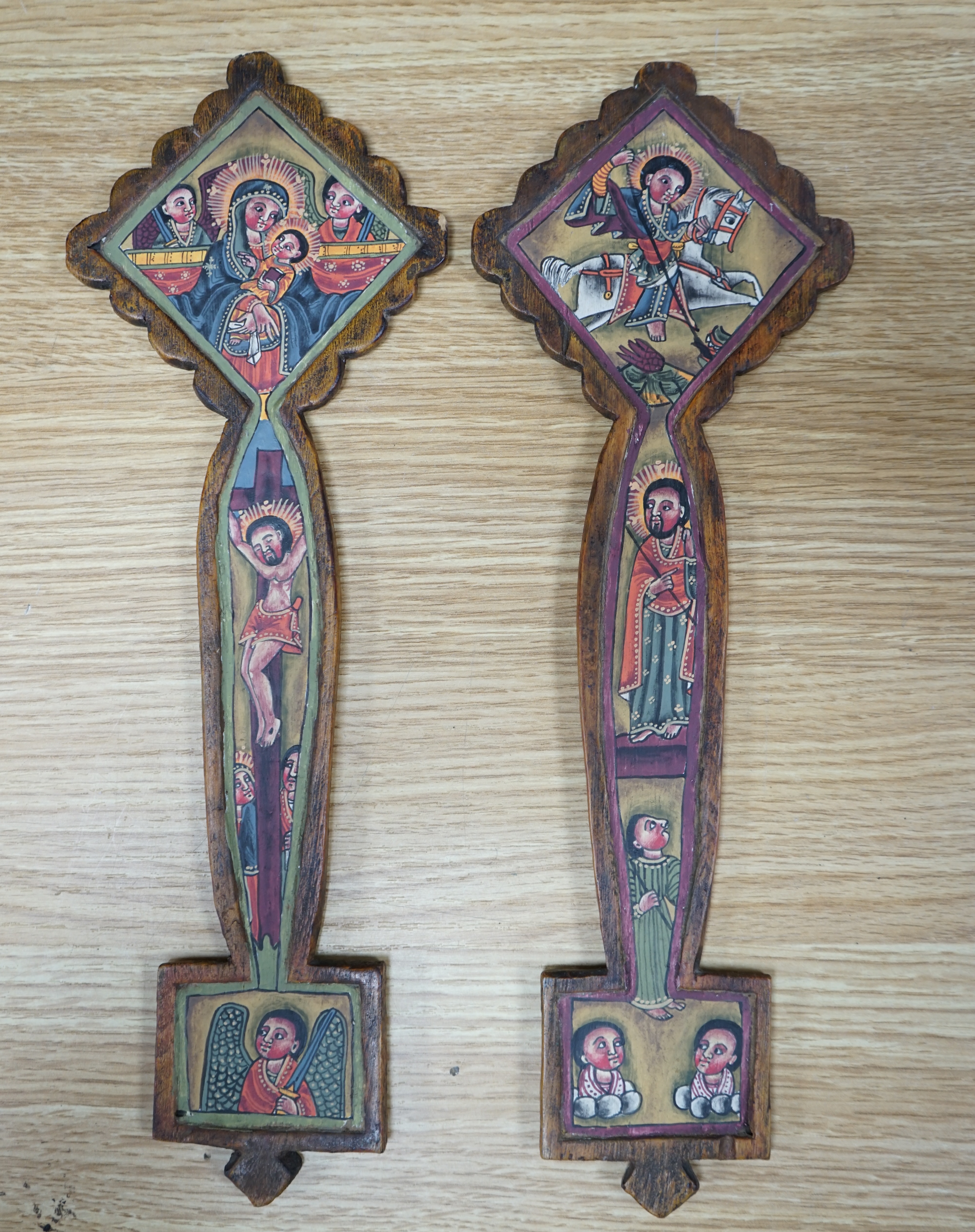 A pair of Coptic Church diptych crosses, Ethiopia, 34cm high. Condition - fair to good